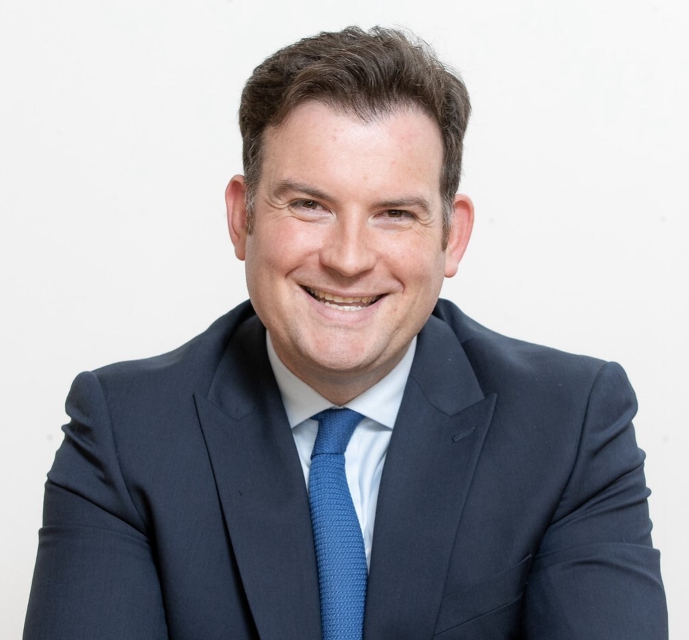 Joel Charles looking at camera