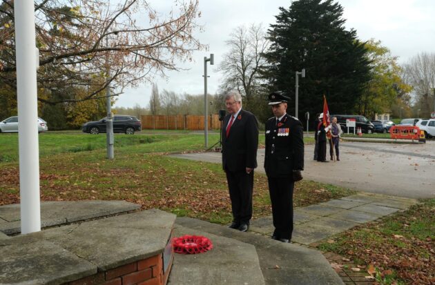 PFCC and CFO laying a wreath at Remembrance Flag