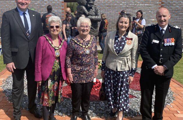 Joel Charles and guests attending the fire service memorial gardens