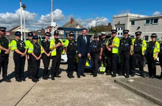 Joel Charles and police officers at the Tendring airshow