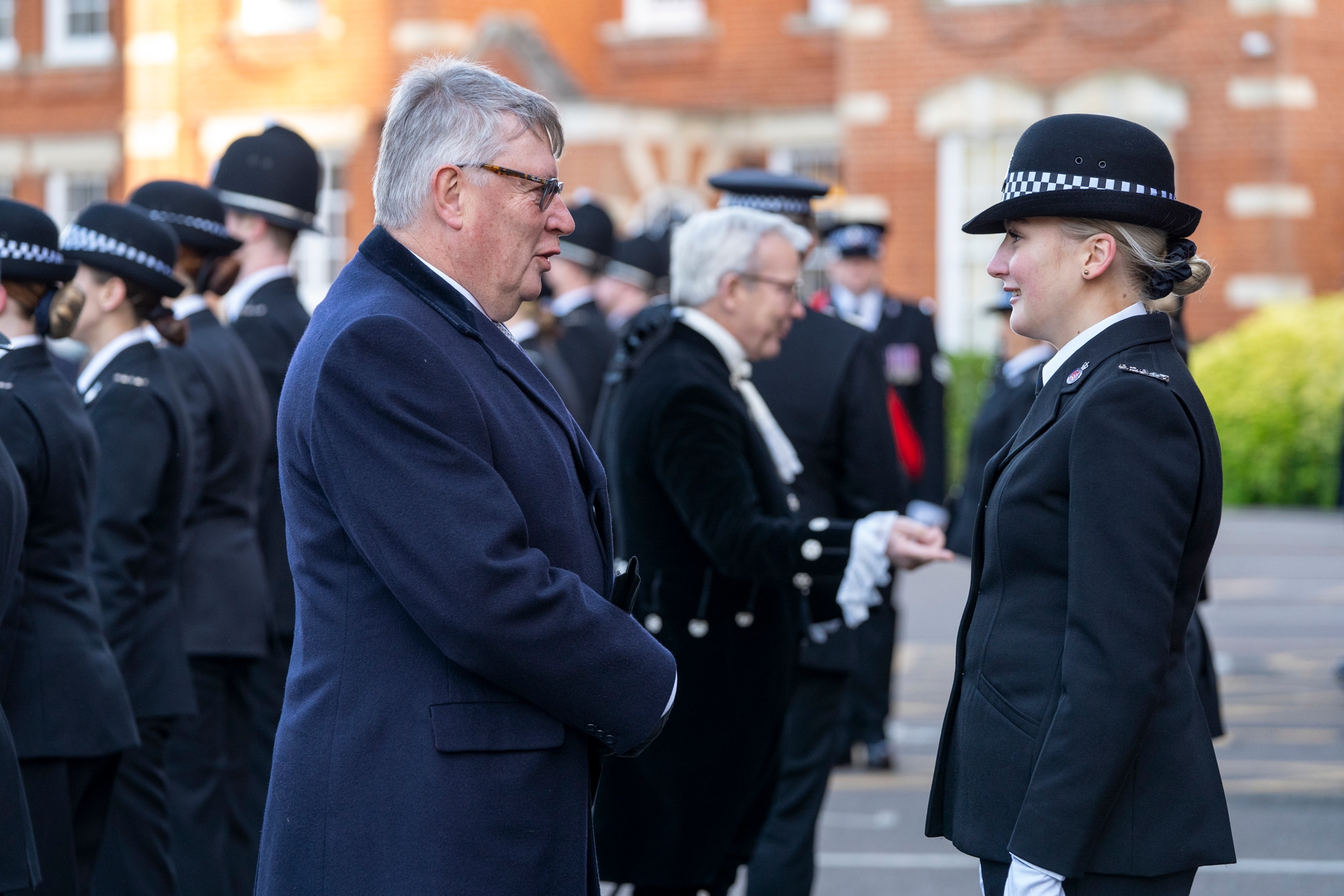 PFCC at Essex Police pass out talking to an officer