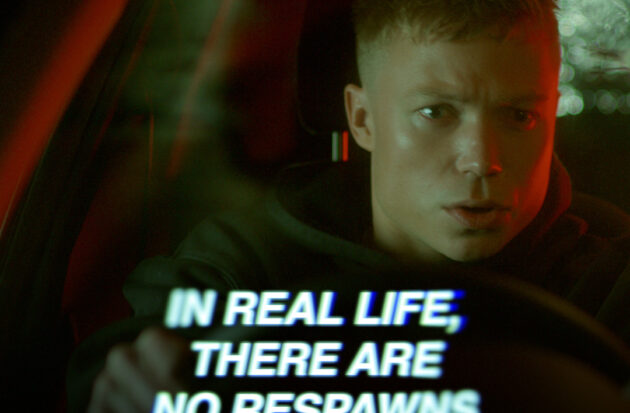 Image of male gaming with text