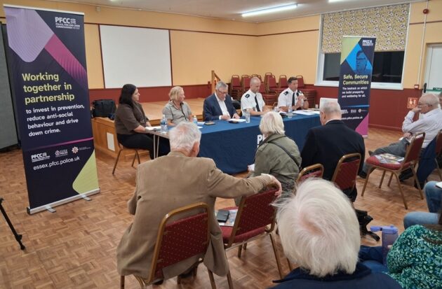 Picture of RH and panel at Thornwood public meeting Sept 26
