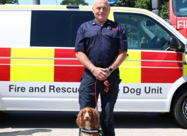 Dog Handler Graham Currie and Fizz the Fire Dog